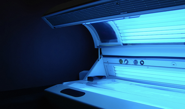 Tanning bed glowing blue