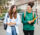 Two college students walking to class